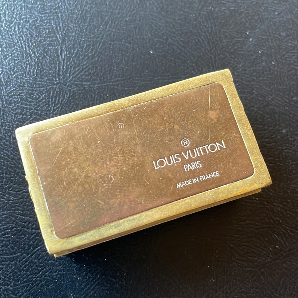 Louis Vuitton trunk paperweight.